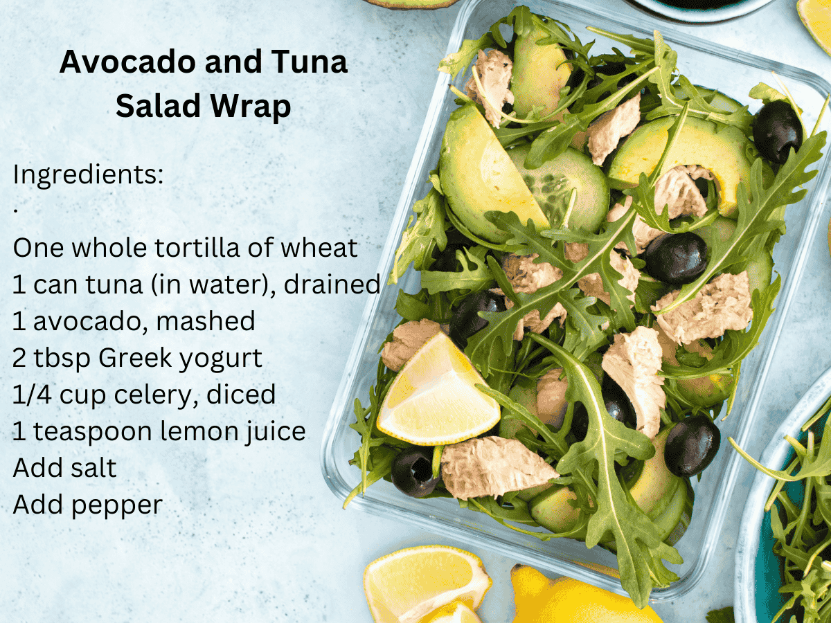 Healthy avocado and tuna wrap on a wooden board.