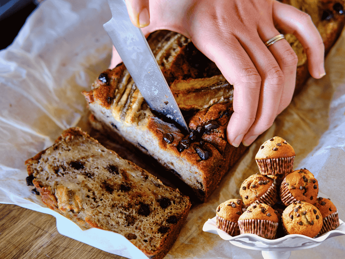 Chocolate chip banana bread topped with melted chocolate chips for a sweet treat.