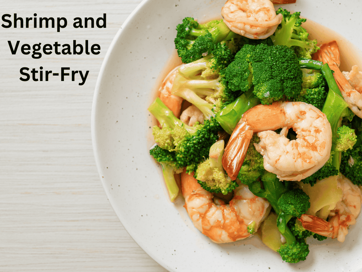 Stir-fried shrimp and colorful vegetables served on rice.